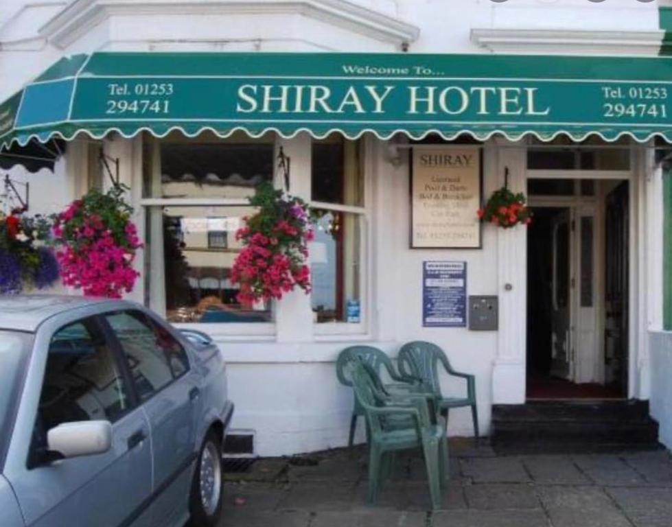 a car parked in front of a shimiya hotel at Shiray Hotel in Blackpool