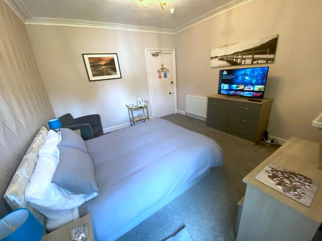 Letto o letti in una camera di Dunrigh Guest House