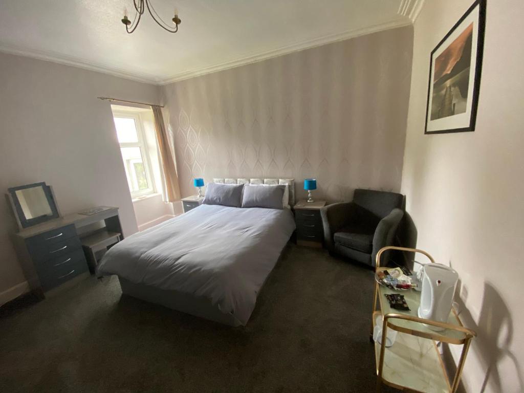 Letto o letti in una camera di Dunrigh Guest House