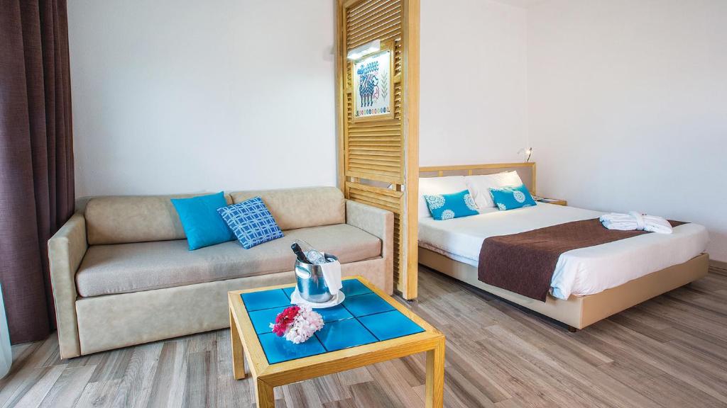 Postel nebo postele na pokoji v ubytování Baia di Conte Resort