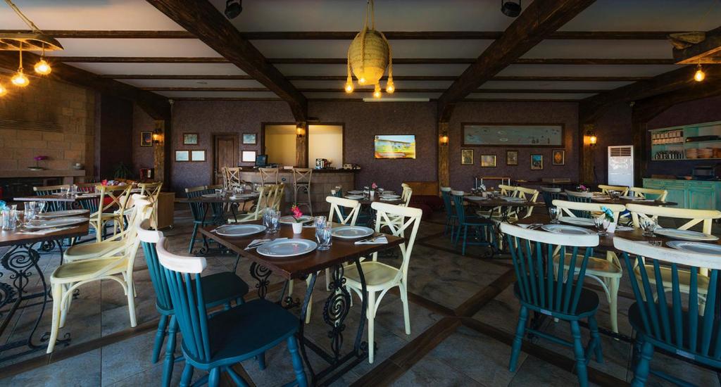 Restaurace v ubytování Assos Zeyti̇n Han Special Class Hotel Adults only 12