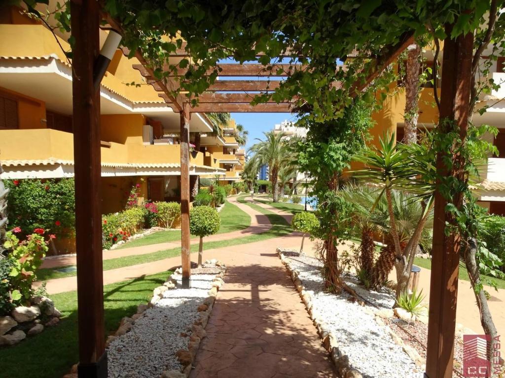 Vonkajšia záhrada v ubytovaní Apartamento Eleonor, La Entrada, Punta Prima, Torrevieja