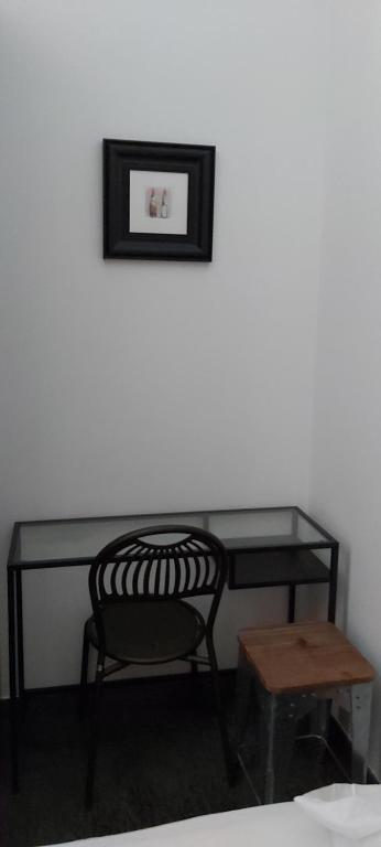 Llit o llits en una habitació de Retro Rooms Termini