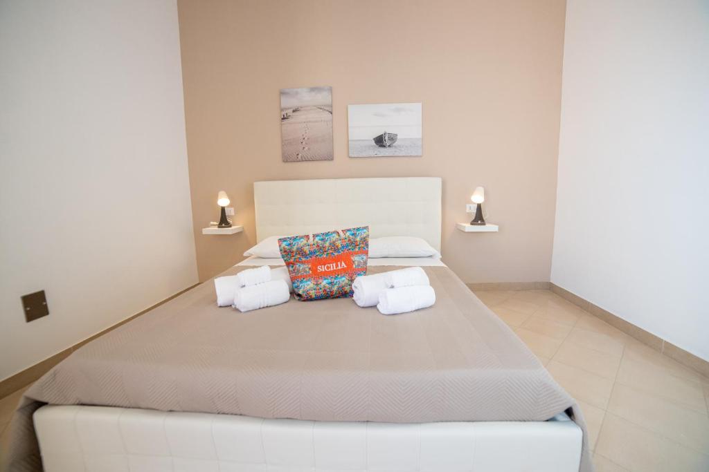 Postel nebo postele na pokoji v ubytování b&b Zio Luciano