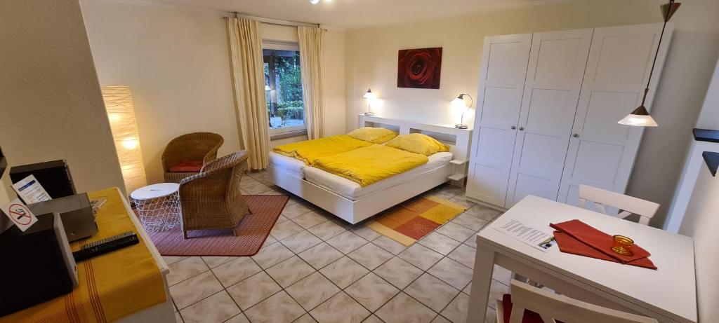 Postel nebo postele na pokoji v ubytování Ferienwohnung "Tecklenburger Augenblicke"