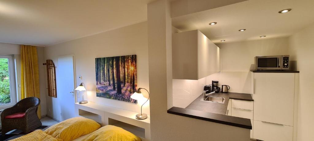 Kuchyň nebo kuchyňský kout v ubytování Ferienwohnung "Tecklenburger Augenblicke"
