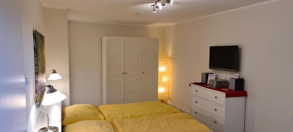 Postel nebo postele na pokoji v ubytování Ferienwohnung "Tecklenburger Augenblicke"