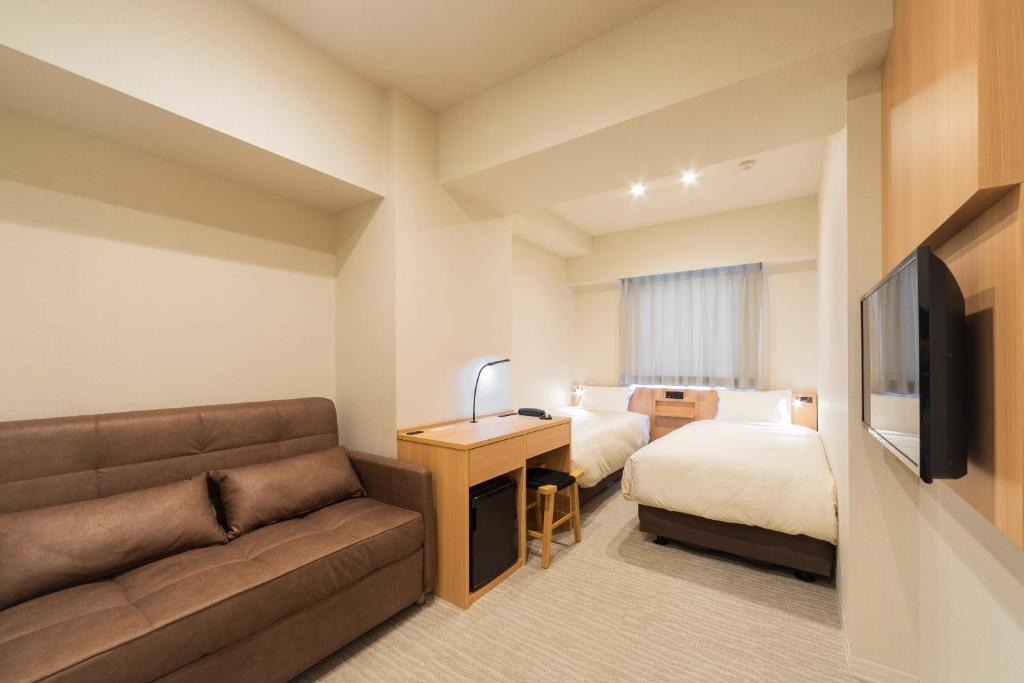 TV a/nebo společenská místnost v ubytování Nesthotel alt Kuramae Station