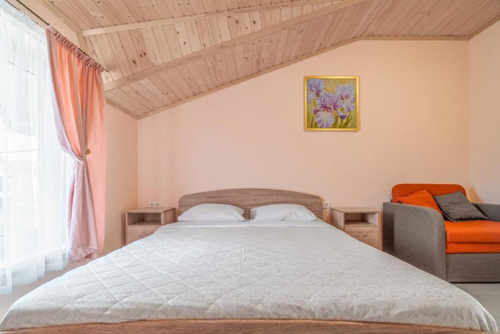 Postel nebo postele na pokoji v ubytování Flamingo Family Club