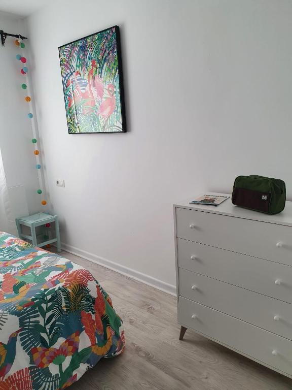 Posteľ alebo postele v izbe v ubytovaní Piso Pescaíto - Tarifa Centro