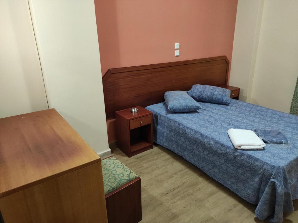 Postel nebo postele na pokoji v ubytování Hotel Lido