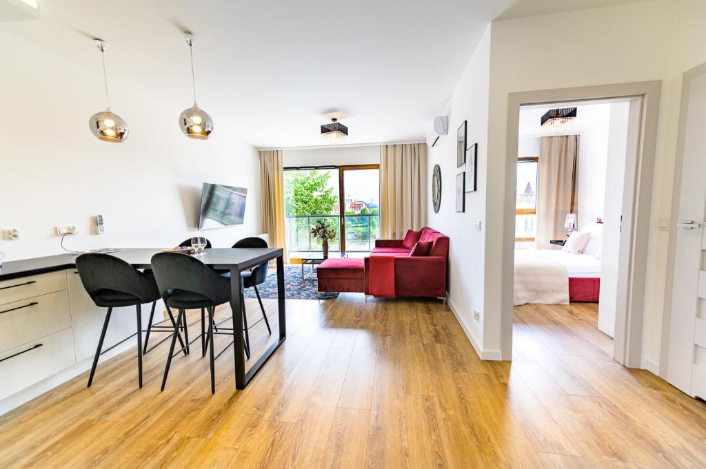 Postel nebo postele na pokoji v ubytování About Art Apartments