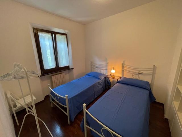 Postel nebo postele na pokoji v ubytování Villa Conero