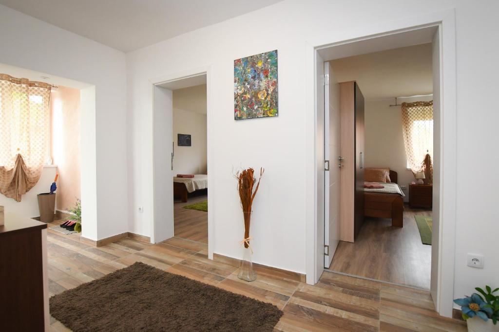 Postel nebo postele na pokoji v ubytování Oasis House