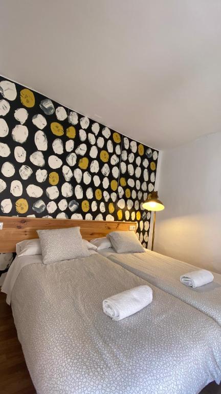 Postel nebo postele na pokoji v ubytování Casa La Espartería de la Corredera
