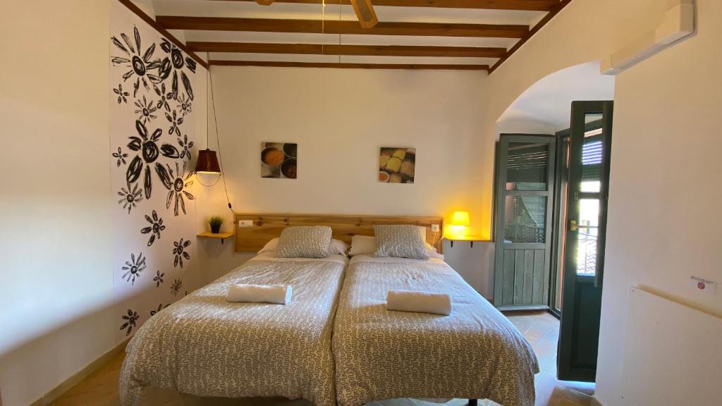 Postel nebo postele na pokoji v ubytování Casa La Espartería de la Corredera