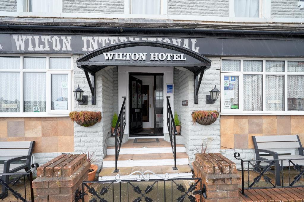 a building with the entrance to a willion hotel at The Wilton International in Blackpool