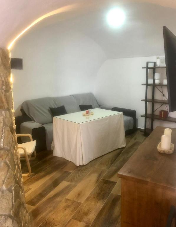Postel nebo postele na pokoji v ubytování Cueva Ramón