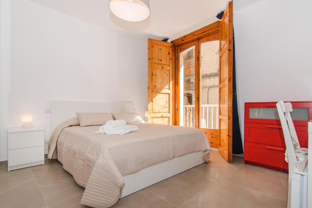 Postel nebo postele na pokoji v ubytování Casa Di Hilde