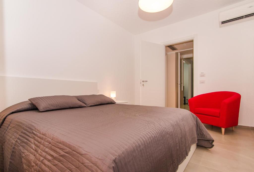 Postel nebo postele na pokoji v ubytování Casa Di Hilde