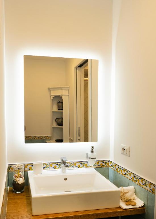 Ванная комната в Levante - lovely flat with terrace & sea view