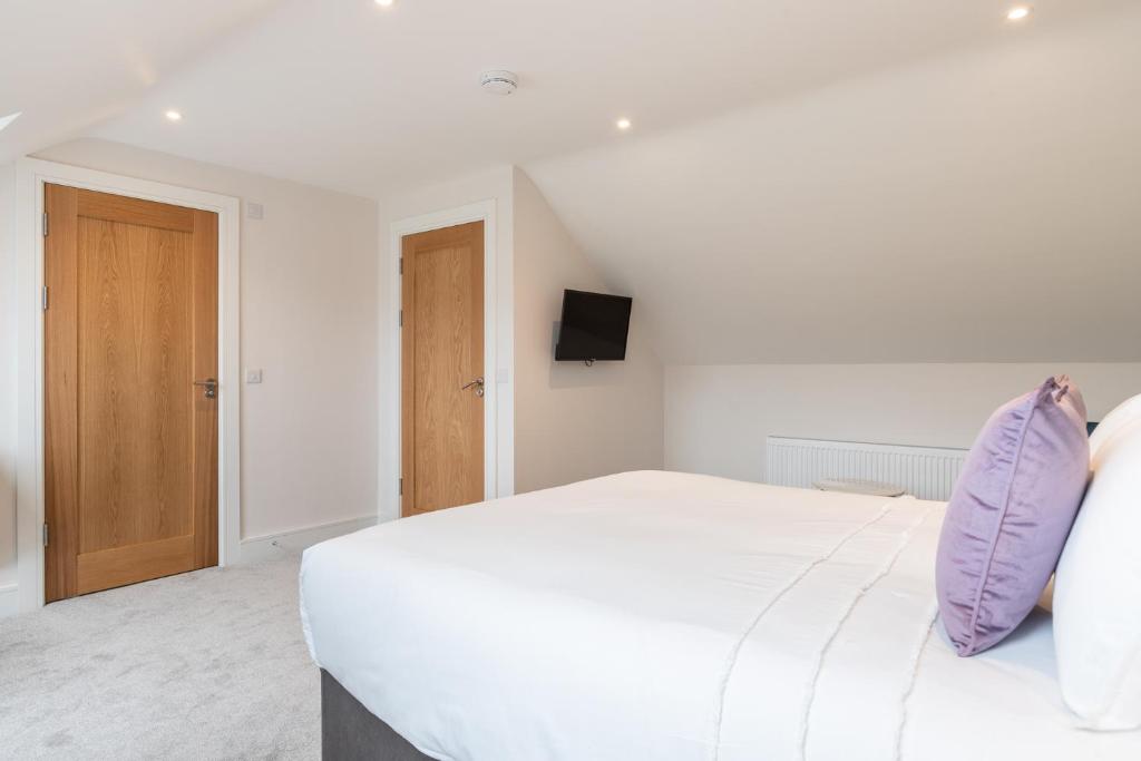 Postelja oz. postelje v sobi nastanitve The Hawthorn Rooms Dingle
