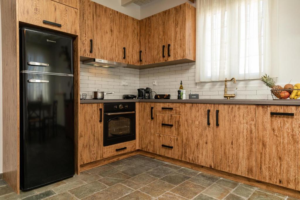 A kitchen or kitchenette at Naxian Icon Luxury Residence