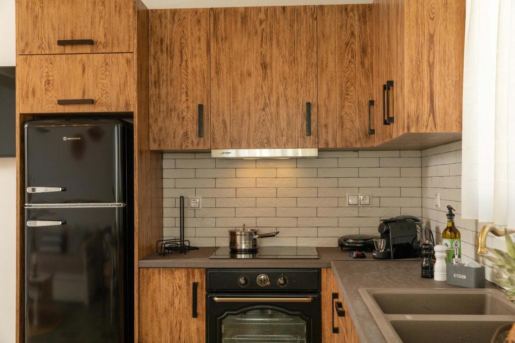 A kitchen or kitchenette at Naxian Icon Luxury Residence