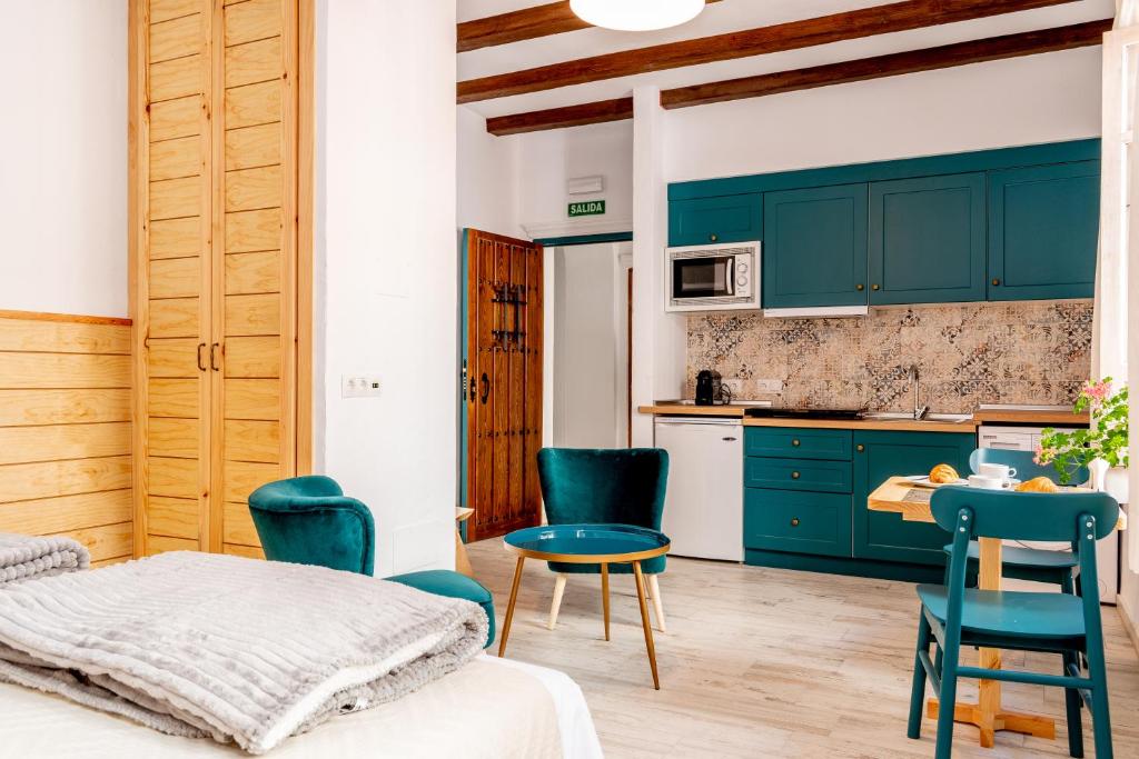 Kuchyň nebo kuchyňský kout v ubytování Casa Del Patio - Boutique Apartments