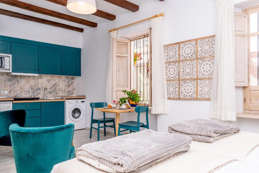 Postel nebo postele na pokoji v ubytování Casa Del Patio - Boutique Apartments
