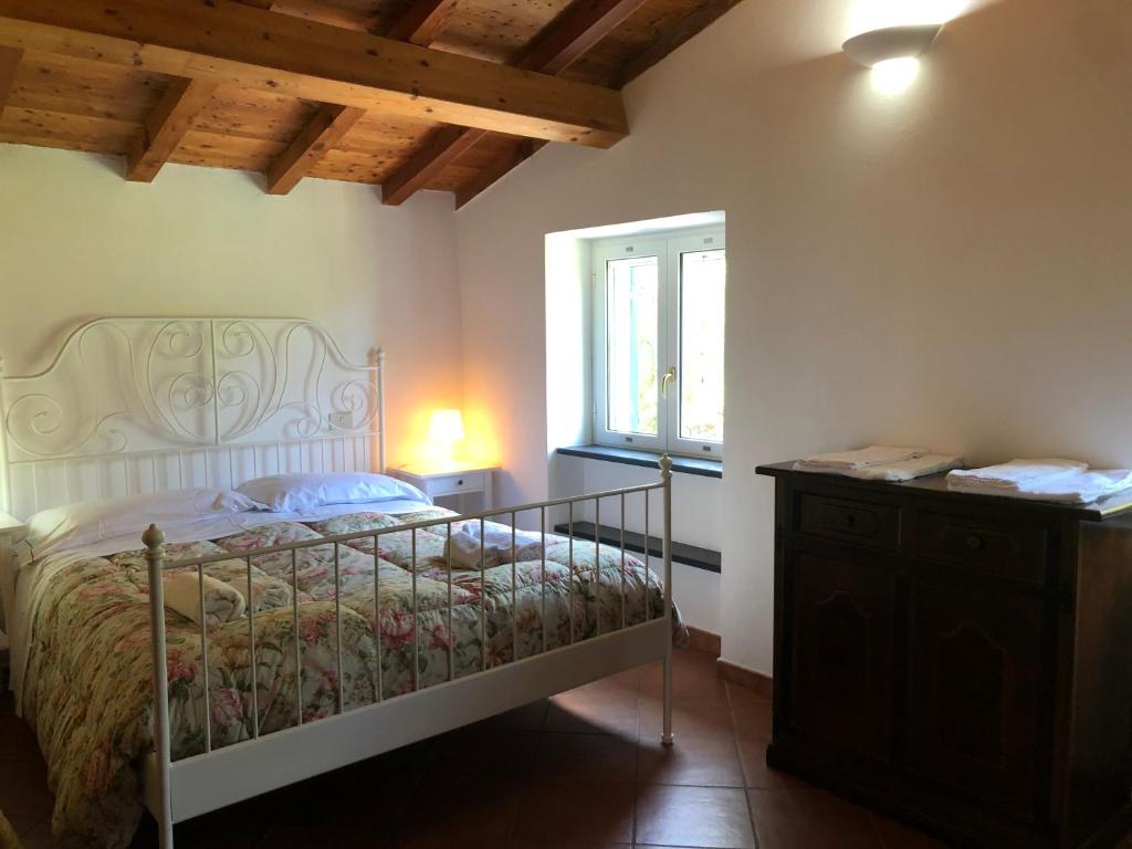 A bed or beds in a room at Dolcevia