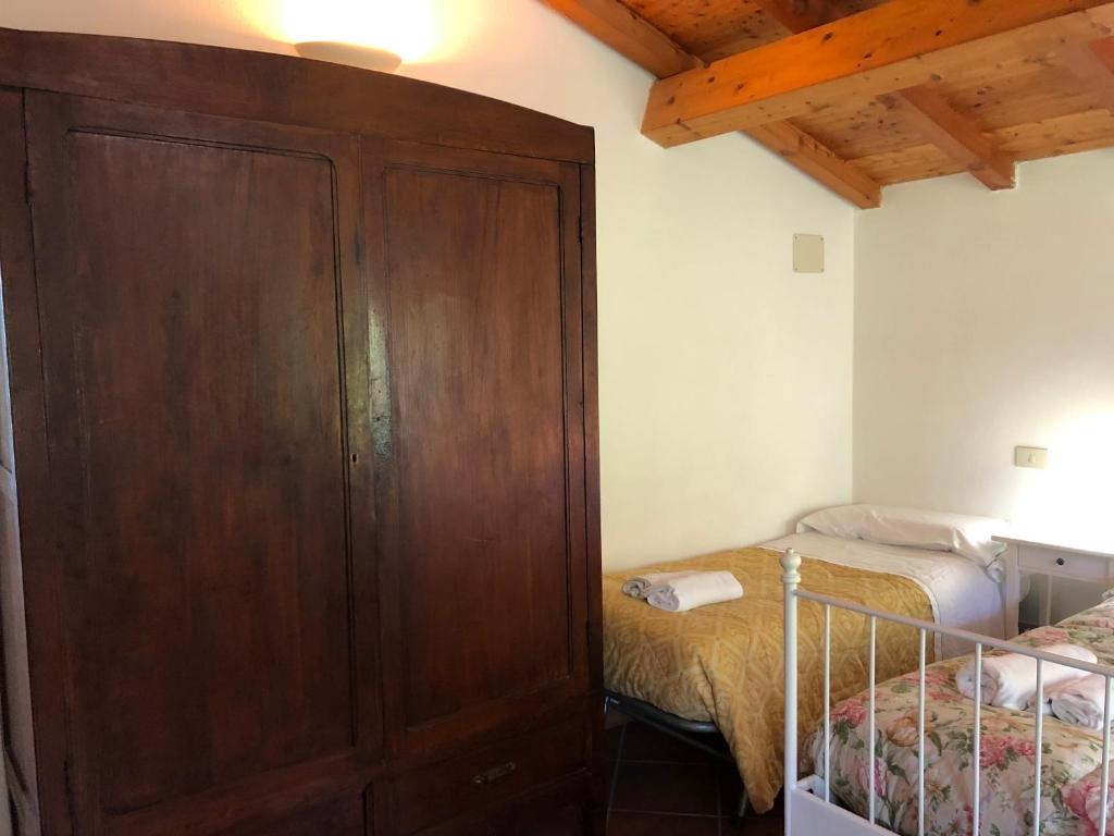 A bed or beds in a room at Dolcevia
