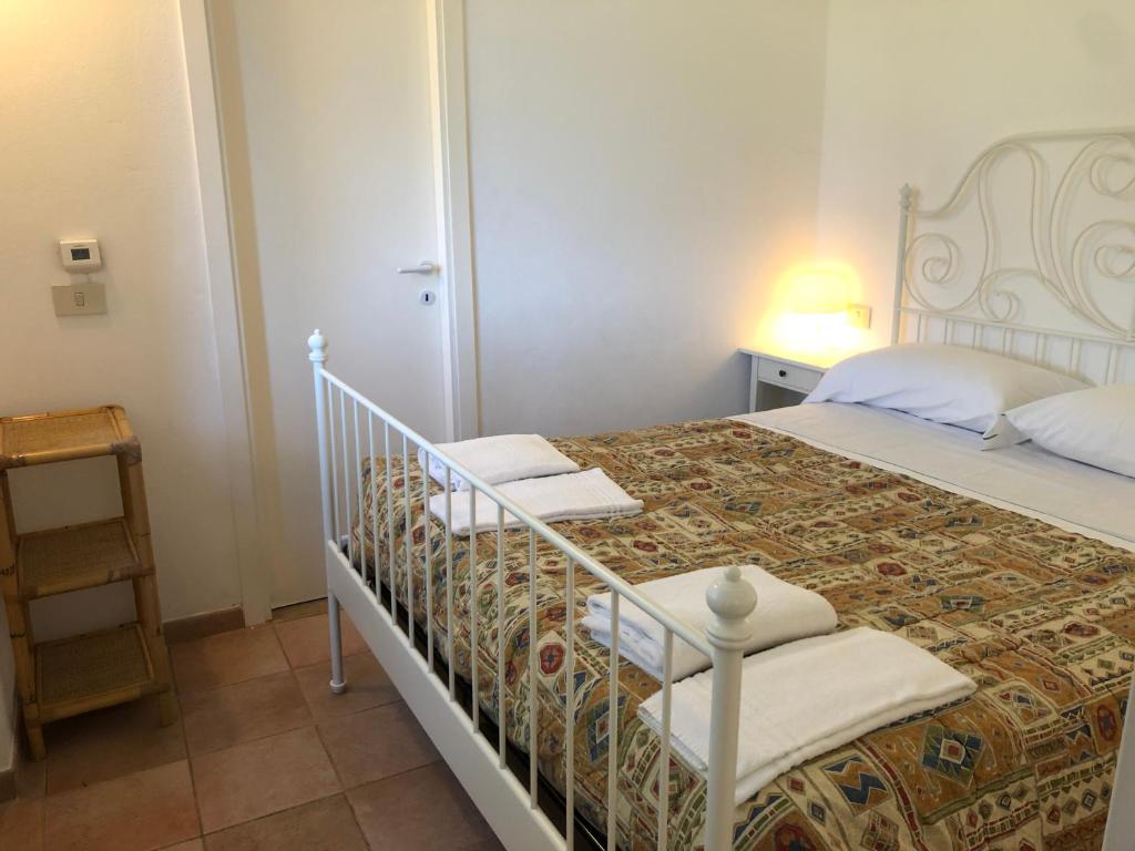 A bed or beds in a room at Dolcevia