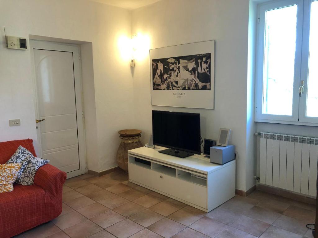 A television and/or entertainment centre at Dolcevia