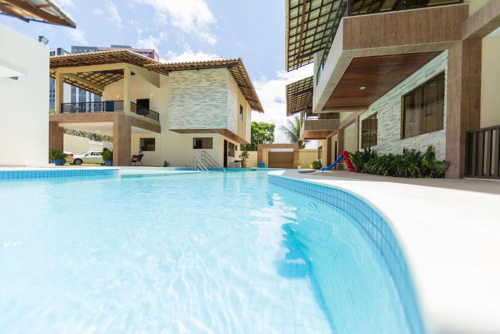  Vila com 4 casas na praia de Cotovelo por Carpediem