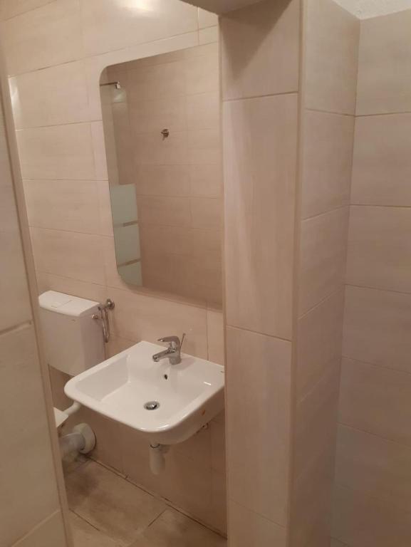 Kúpeľňa v ubytovaní Apartments Škerlep