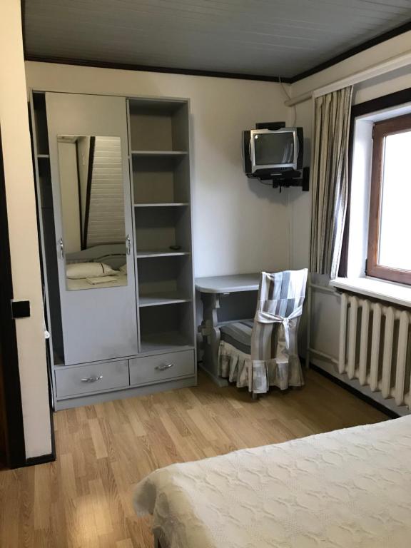 Postel nebo postele na pokoji v ubytování Girskiy Svitanok