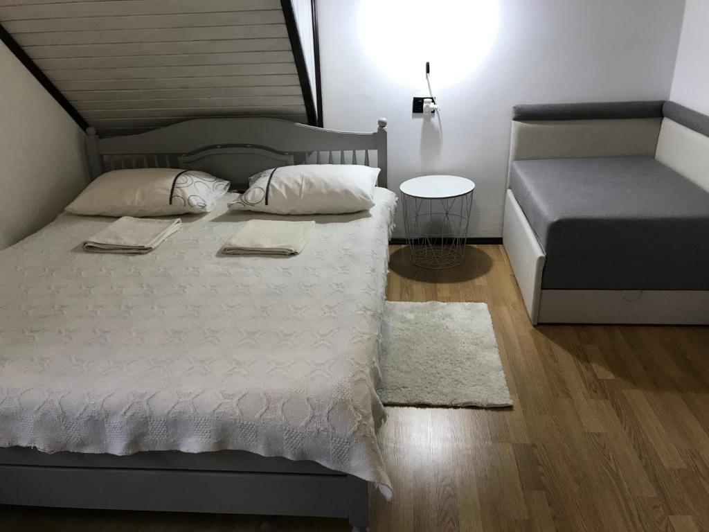 Postel nebo postele na pokoji v ubytování Girskiy Svitanok
