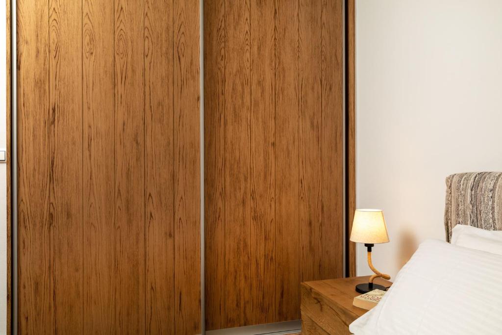 A bed or beds in a room at Naxian Icon Luxury Residence