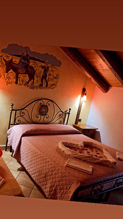 Postel nebo postele na pokoji v ubytování Agriturismo la Cavallina
