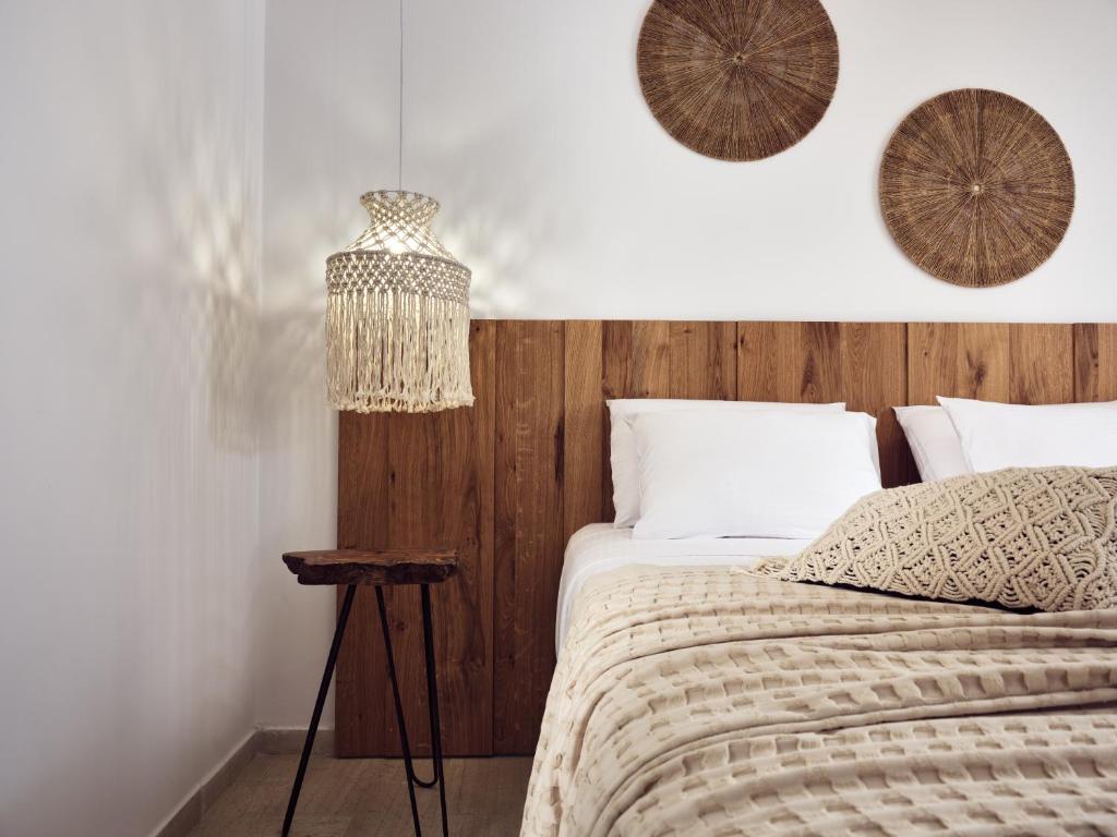 Postel nebo postele na pokoji v ubytování Shellona Rooms & Apartments