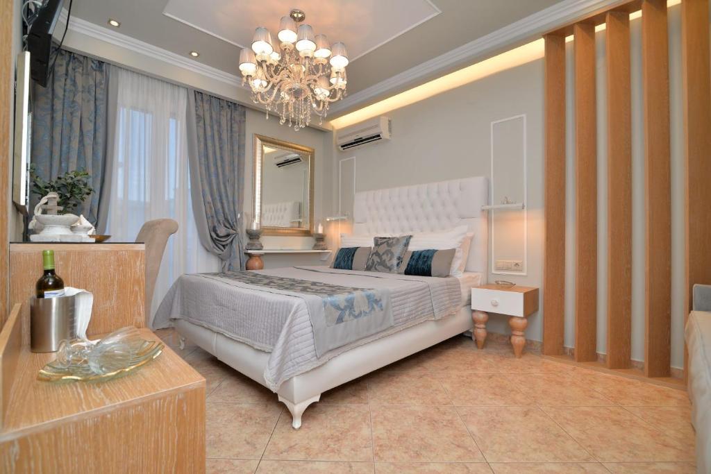 Posteľ alebo postele v izbe v ubytovaní Epavlis Luxury apts