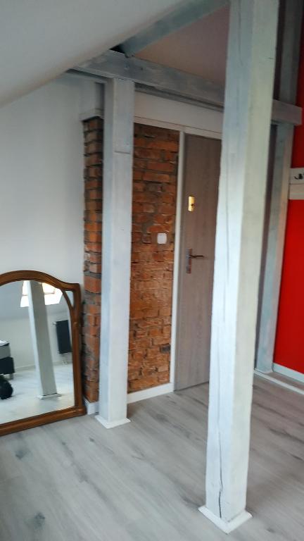 Fotografia z galérie ubytovania Apartament Witkacego Czerwony v destinácii Słupsk
