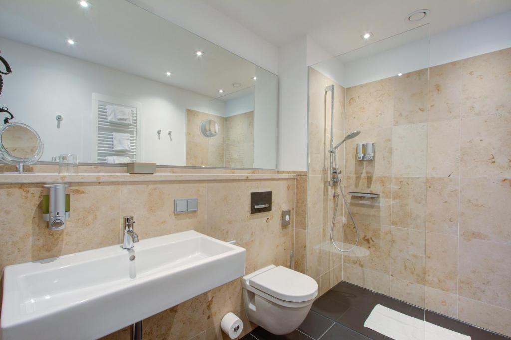 Koupelna v ubytování Qube Hotel Bahnstadt