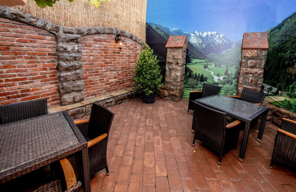 Patio nebo venkovní prostory v ubytování Hotel Novotheos