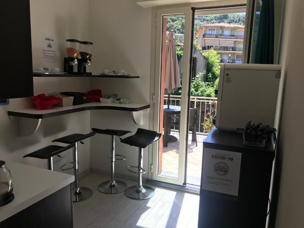 Kuchyň nebo kuchyňský kout v ubytování Le Divine La Terrazza