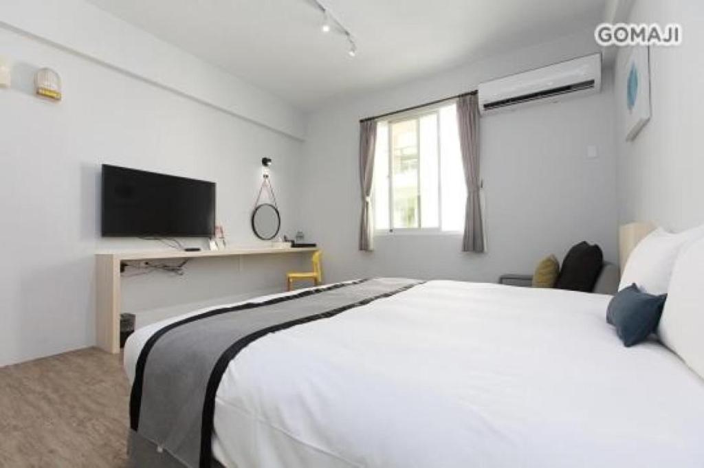 TV a/nebo společenská místnost v ubytování Youngs Hotspring Hotel