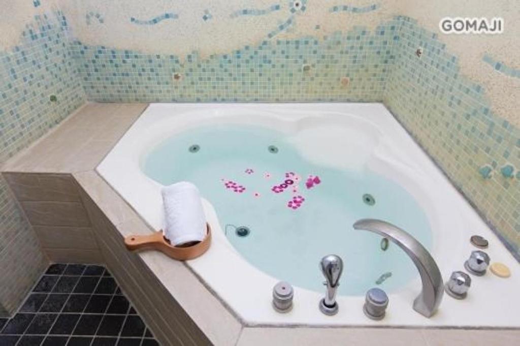 Fotografie z fotogalerie ubytování Youngs Hotspring Hotel v destinaci Ťiao-si