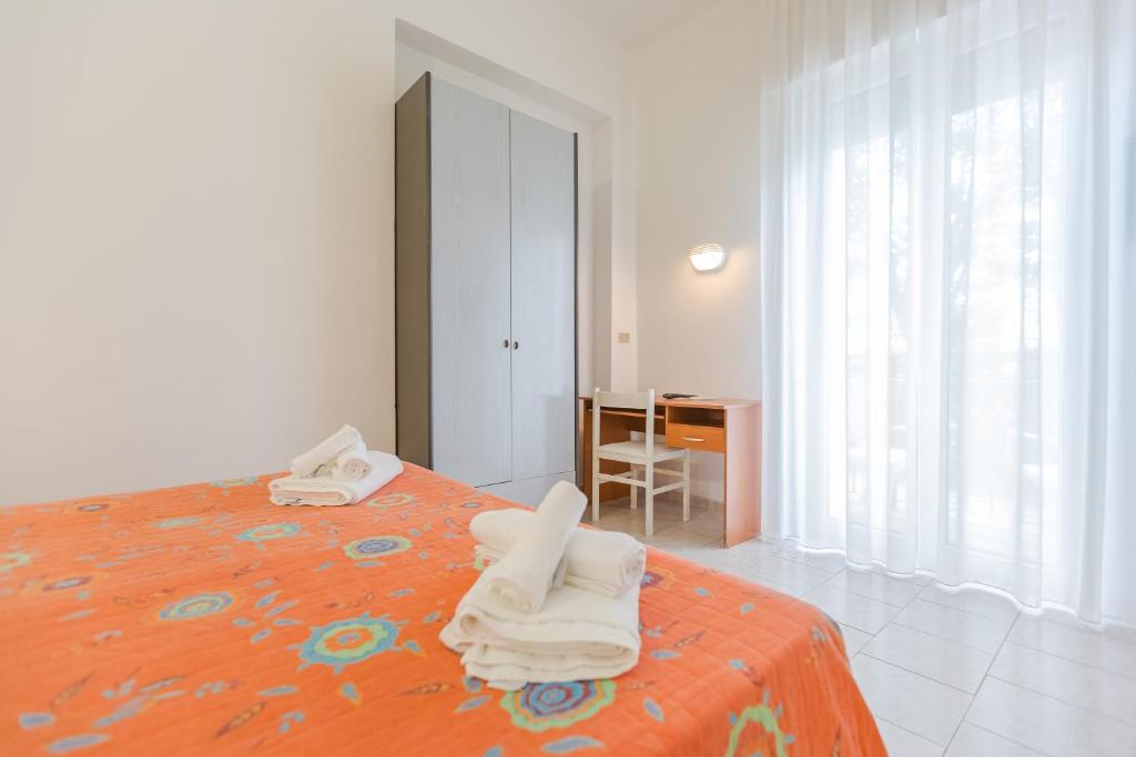 Postel nebo postele na pokoji v ubytování Hotel Marylise