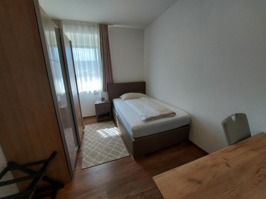 Postel nebo postele na pokoji v ubytování Wollsdorferhof